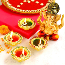 4 Colourful Diyas and Raja Ganesha Idol: 
