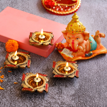 4 Swastik Diyas and Cute Bal Ganesha Idol: Gifts for Parents