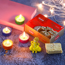 4 Tealight Diyas and Ganesha Idol With Soan Papdi: Gifts for Parents